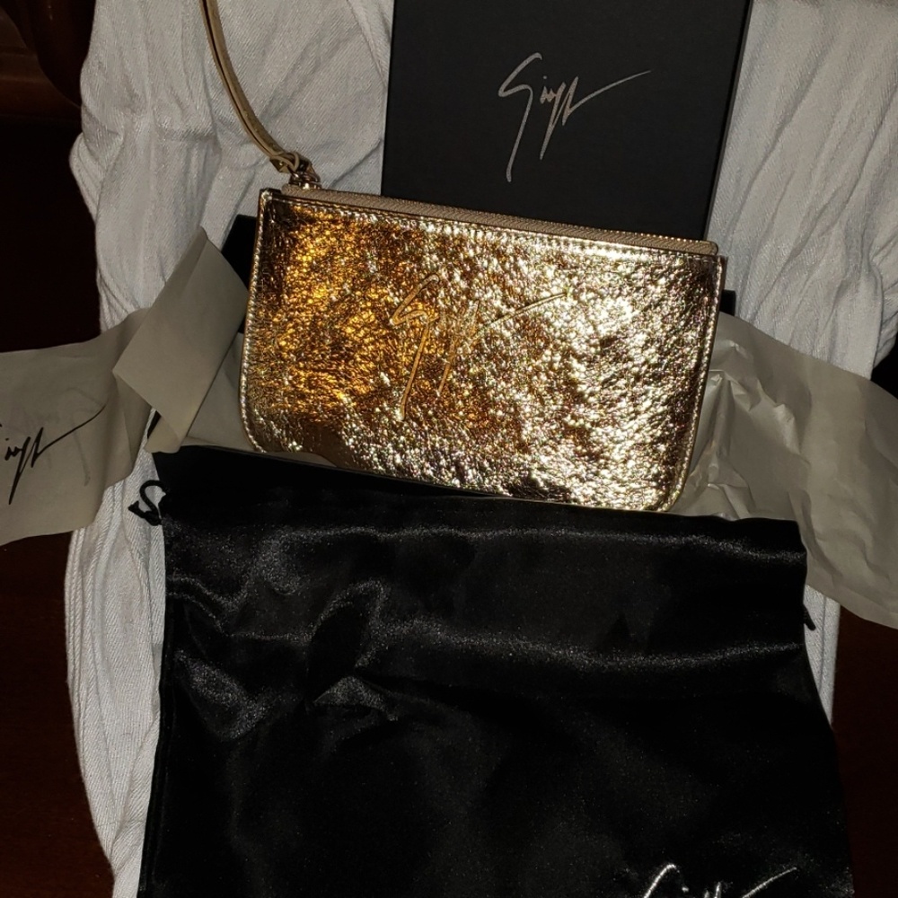 Giuseppe small gold clutch